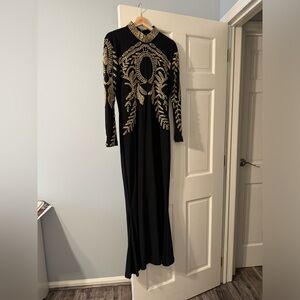 Gorgeous black custom made dress hand beaded gold beads.